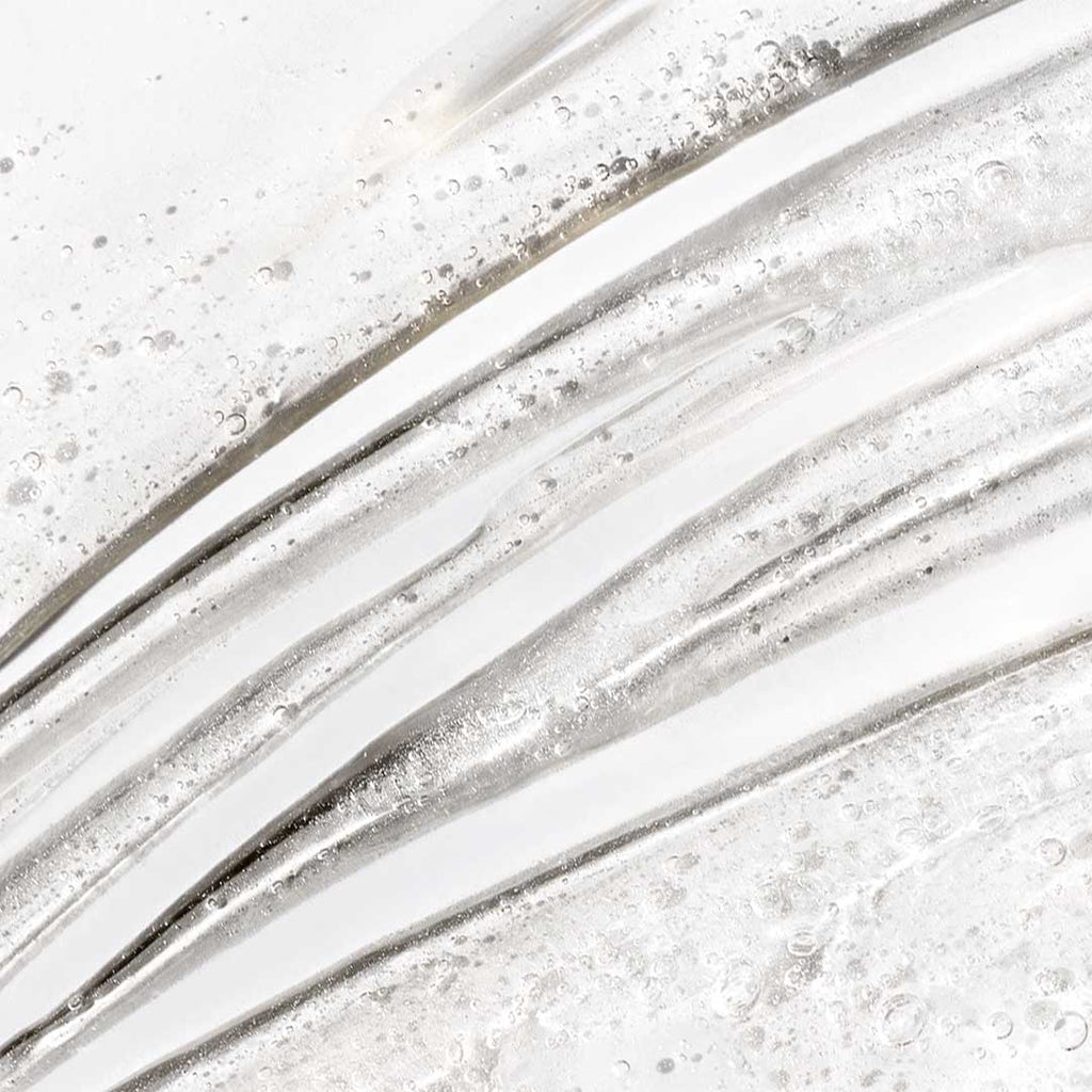 Special Cleansing Gel ist ein seifenfreies Reinigungsgel mit Bläschen und Schlieren auf einer weißen Oberfläche, das den natürlichen Feuchtigkeitshaushalt der Haut bewahrt.